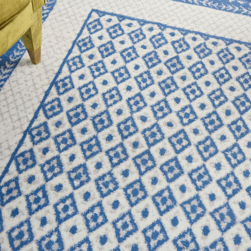 Ivory and Blue Geometric Area Rug